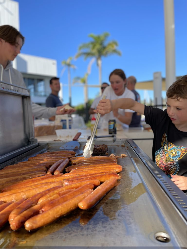 Sausages being cooked on a BBQ