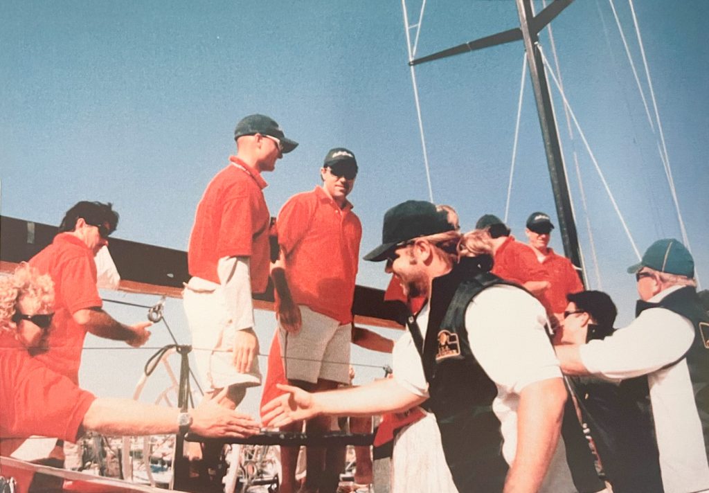 Russell Crowe congratulates the Wild Oats IX crew for taking out the treble