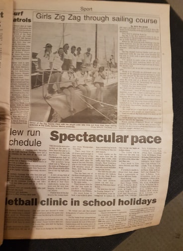 Girls zig zag through sailing course